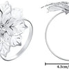 Silver metal napkin rings featuring a detailed floral design and a smooth circular ring.