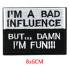 Black and white embroidered letter patch with text I'M A BAD INFLUENCE BUT DAMN I'M FUN!!!