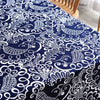 Dark blue linen fabric with white bohemian floral and paisley patterns
