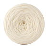 A ball of cream colored soft T-shirt yarn used for crochet