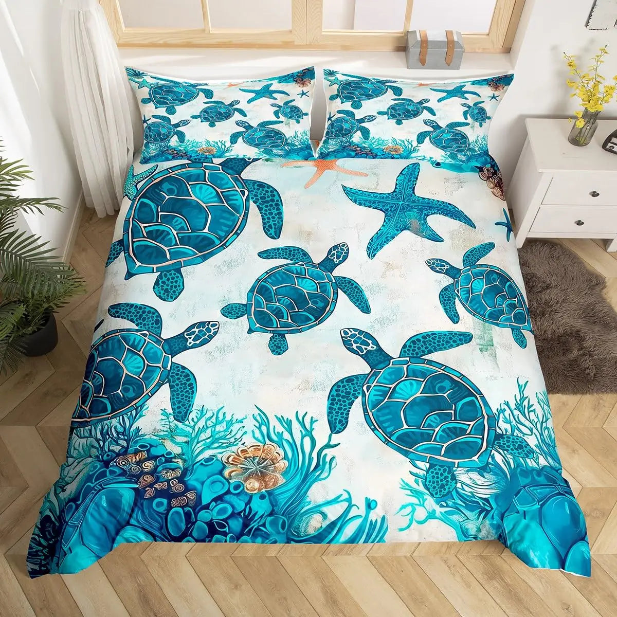 A sea turtle patterned duvet cover set featuring vibrant blue and teal designs on a white background.