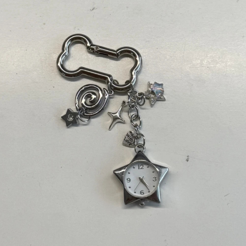 Silver star-shaped pocket watch keychain with an adjustable clock mechanism and charms