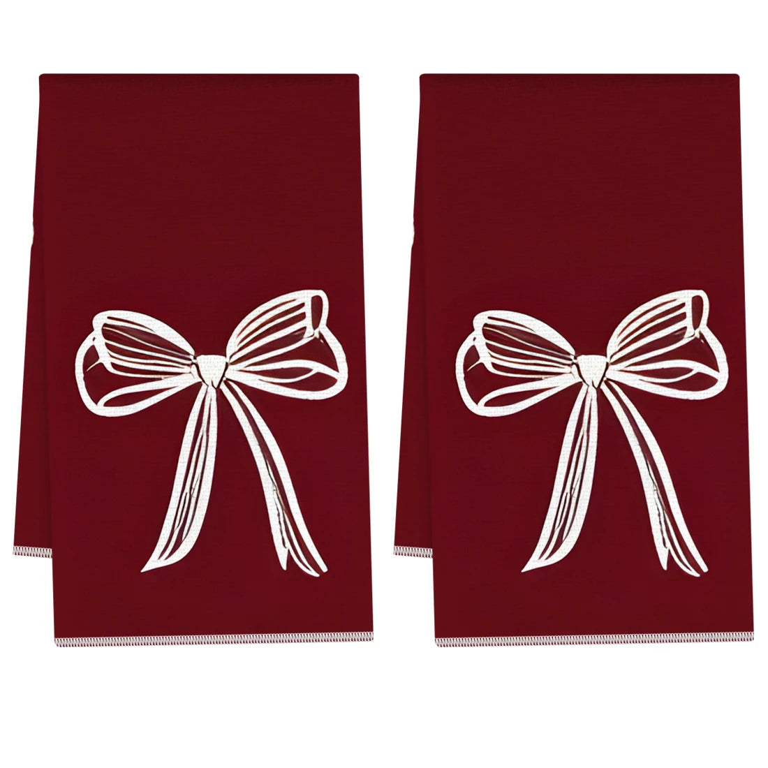 A set of two deep red kitchen towels featuring white bow designs.