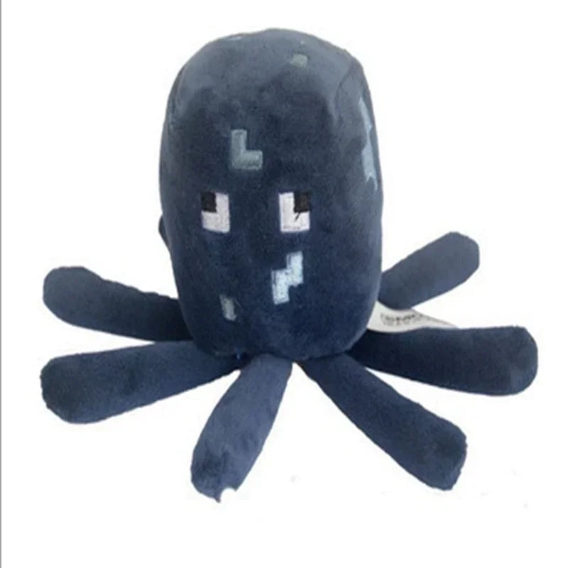 A dark blue stuffed dragon plush toy with small white embroidered eyes and multiple flippers.