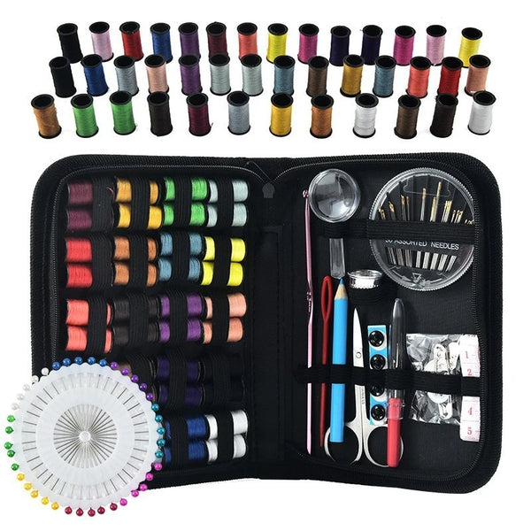 A portable sewing kit showing various threads, needles, and tools organized in a black case.