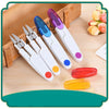 A set of colorful seam rippers and thread cutters in various shades including blue, purple, and red, resting on a wooden surf
