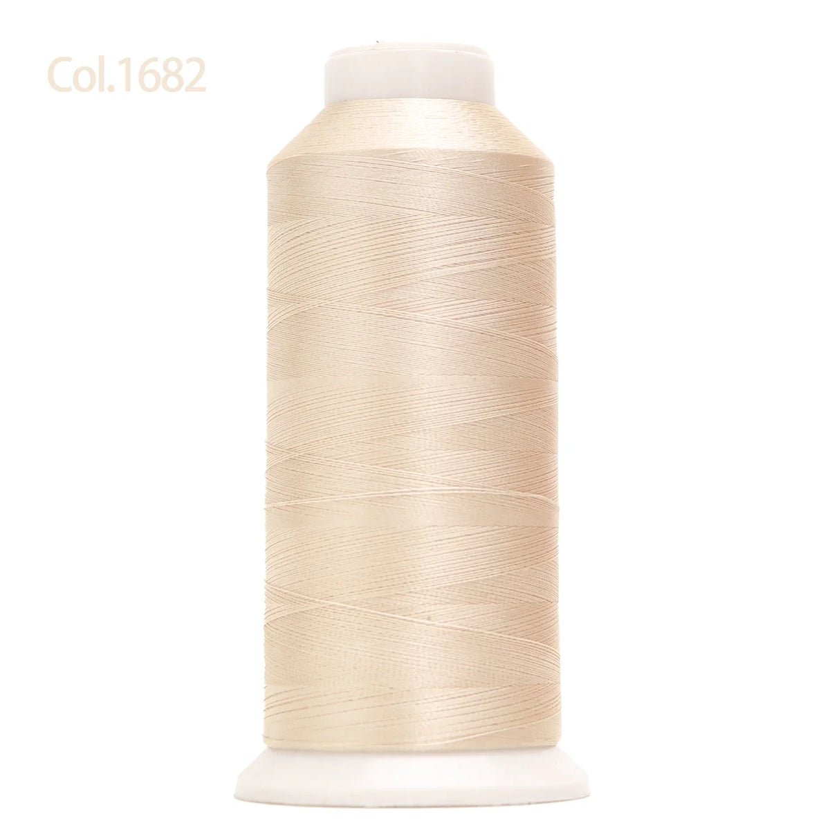 A spool of beige high tenacity machine embroidery thread is shown against a white background.