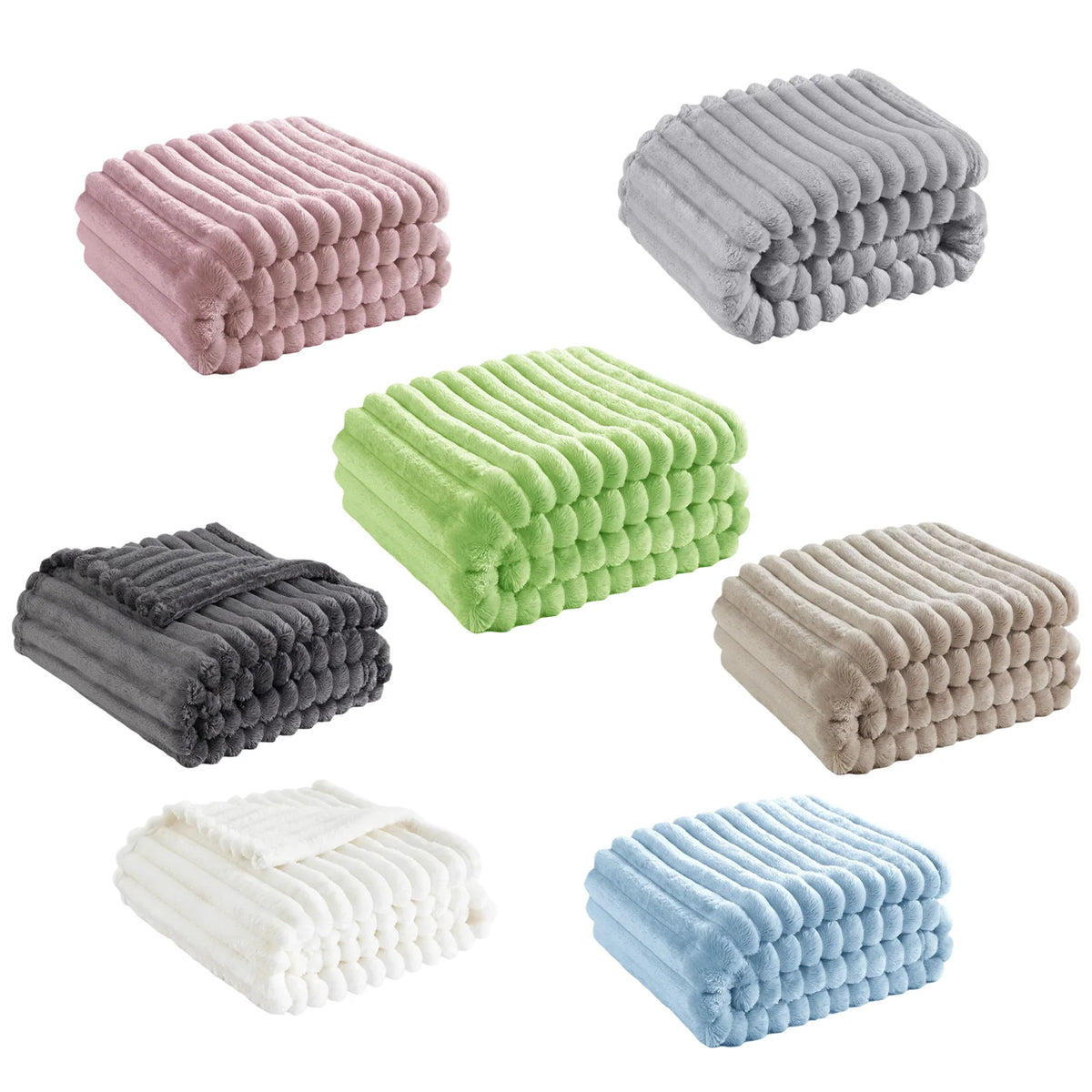 A collection of folded flannel throw blankets in various colors including pink, gray, lime green, charcoal, beige, and light 