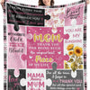 A pink and black puzzle-piece blanket featuring heartfelt messages like I love you and thank you mom