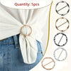 Five metal round clip buckles shown on a white fabric tied around a denim shirt