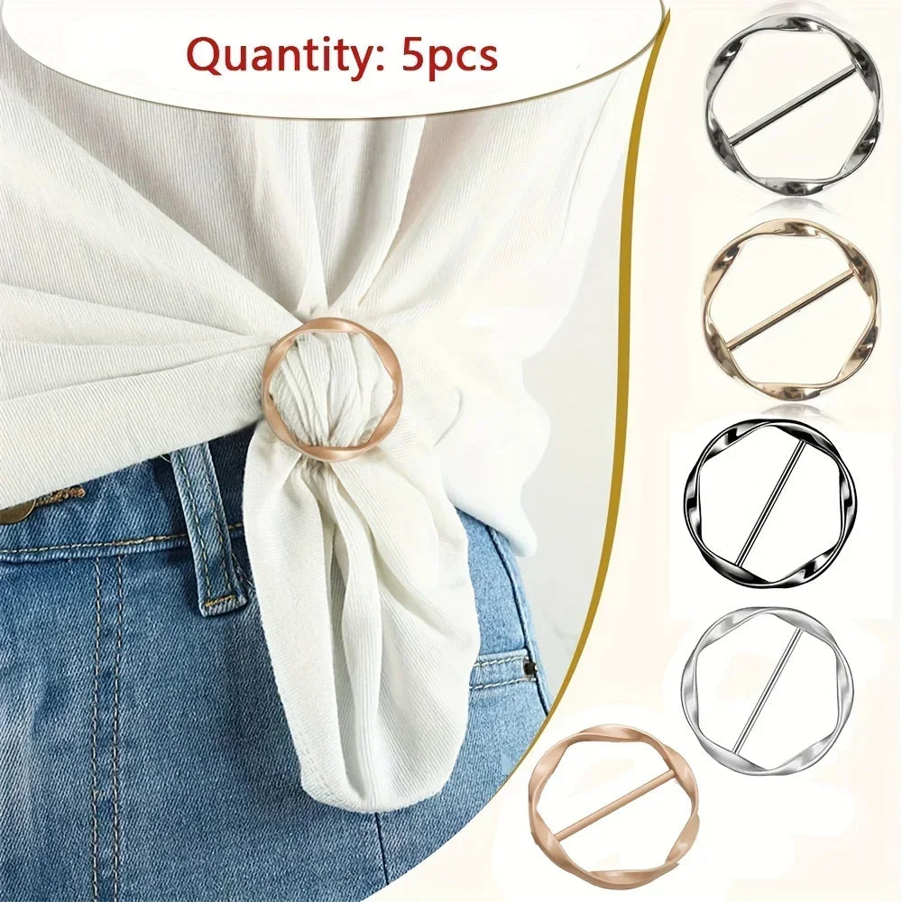 Five metal round clip buckles shown on a white fabric tied around a denim shirt