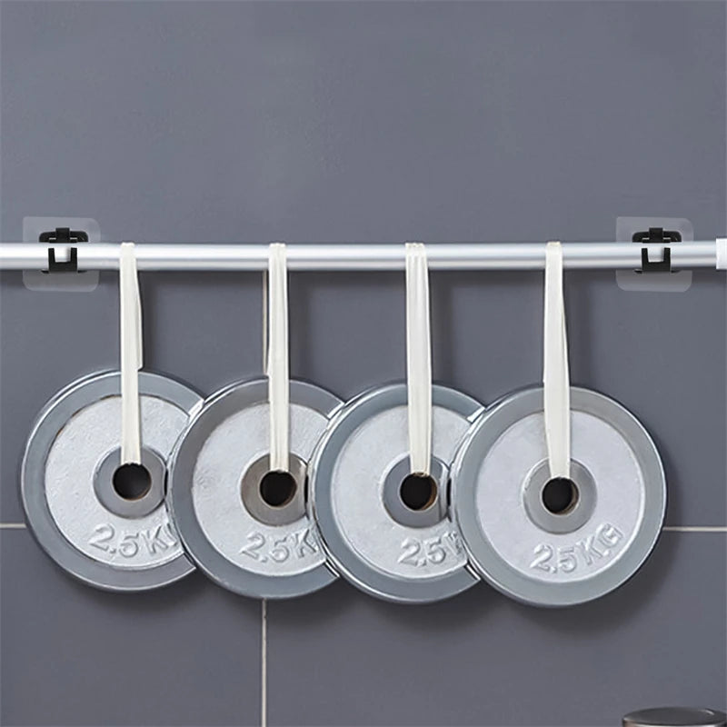 Silver curtain rod brackets with white cord and 2.5kg capacity hanging on a white rod.