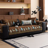 A brown sofa mat cover featuring a Christmas deer pattern on a dark brown fabric.