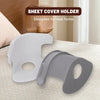 A white sheet cover holder clip and a gray clip are shown on a light-colored surface.