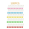 A collection of 100 stainless steel diaper pins in various colors including pink, blue, yellow, and green.