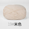 A ball of light beige organic cotton 4ply knitting yarn for crafts.