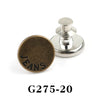 A round, brass button pin with the word JEANS stamped on it, shown next to its adjustable post.