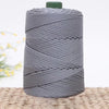 Gray 3mm ice rope crochet yarn wound tightly on a spool for crafting