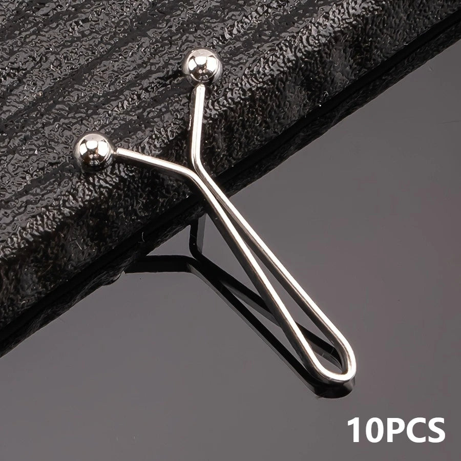 A set of ten silver metal lapel clips with spherical heads shown against a dark surface.