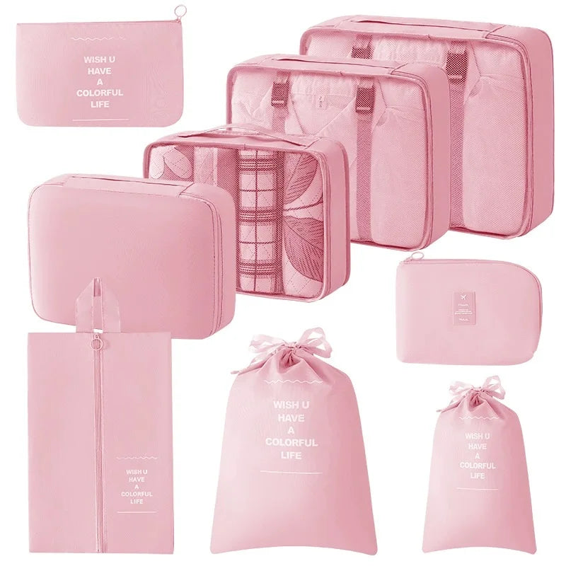 A set of pink mesh storage organizers including pouches and zippered cases for portable organization