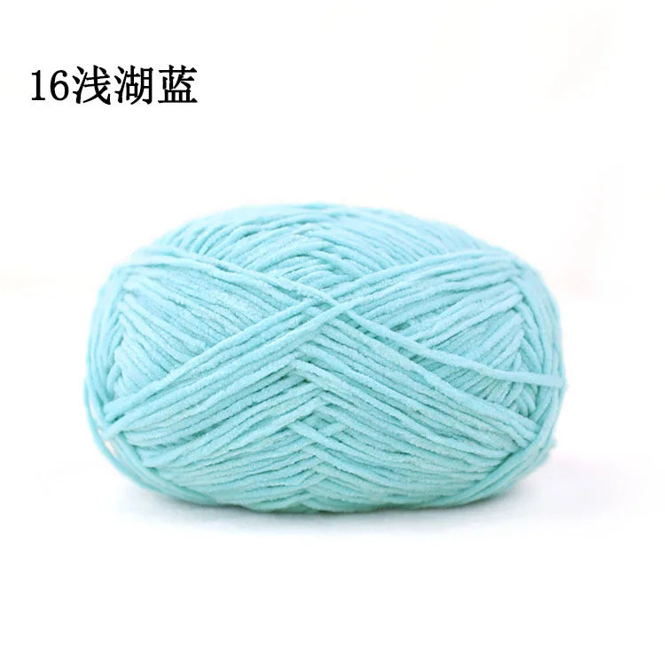 A ball of light blue 3mm matte chenille yarn for knitting and crochet