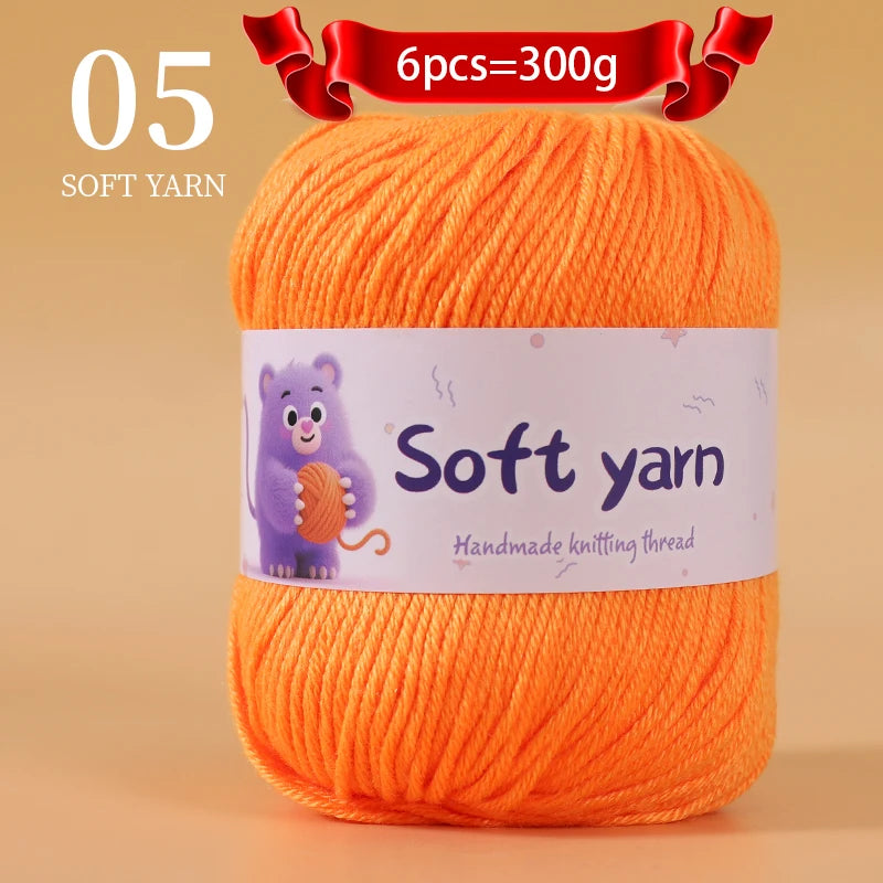 A ball of bright orange soft yarn labeled as 6 pieces equal to 300 grams for handmade knitting thread.
