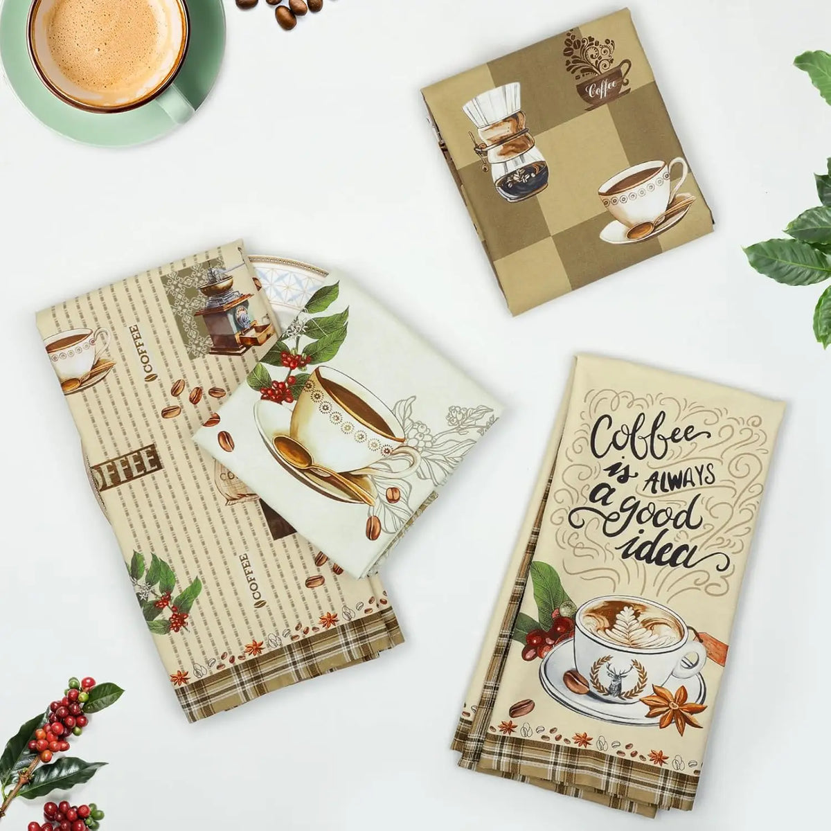A set of four plaid lettered kitchen towels featuring coffee and leaf designs on a white background.