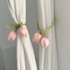 Pink tulip flower curtain tie backs with green fabric on white drapery