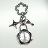 Silver star-shaped pocket watch keychain with a chain and adjustable clock face