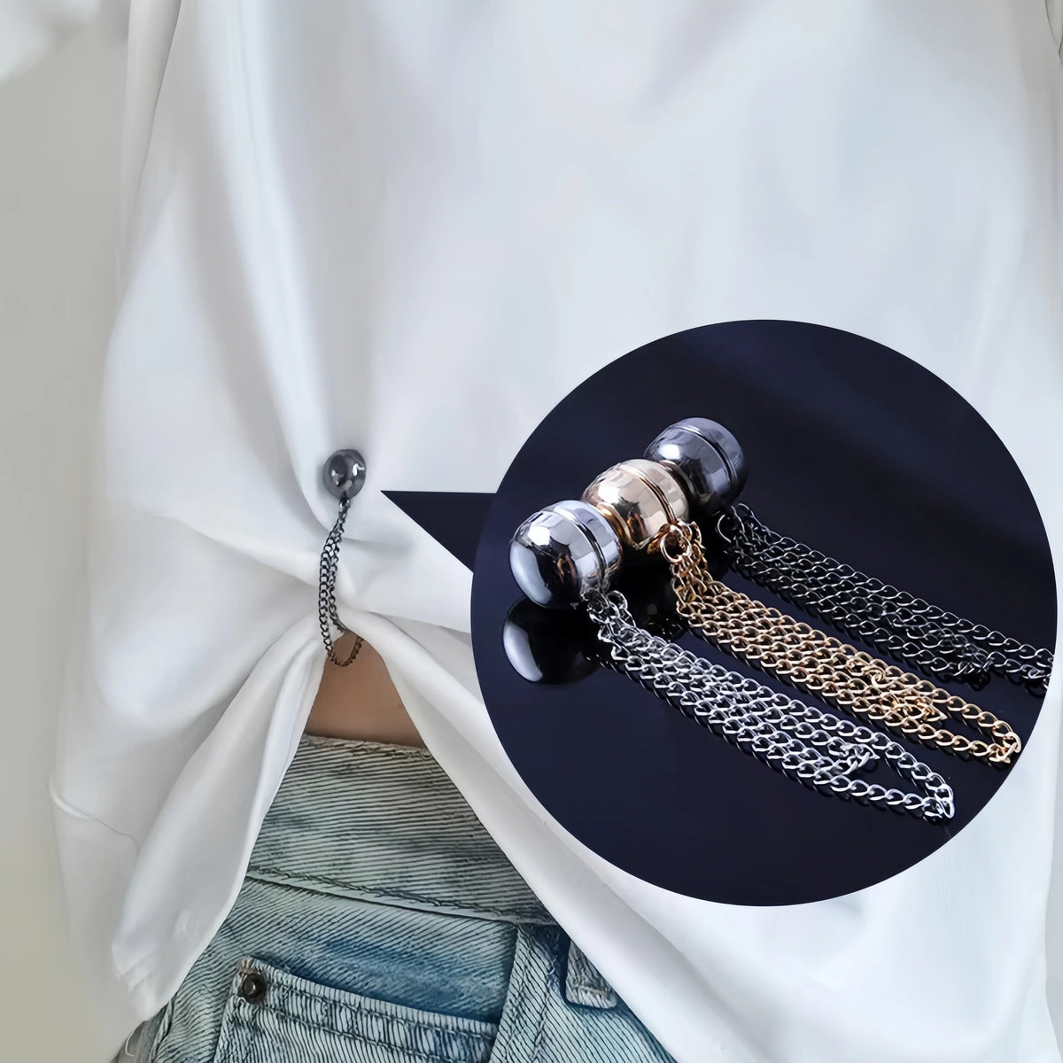 A black circular inset shows a silver and gold chain necklace against a dark background, displayed on a white garment.