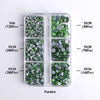 A plastic tray containing various sizes of green glass rhinestones, including SS6, SS10, SS20, SS30, and SS16.