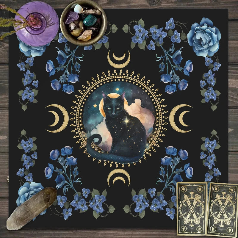 A dark mat featuring a celestial cat, floral elements, and tarot cards.
