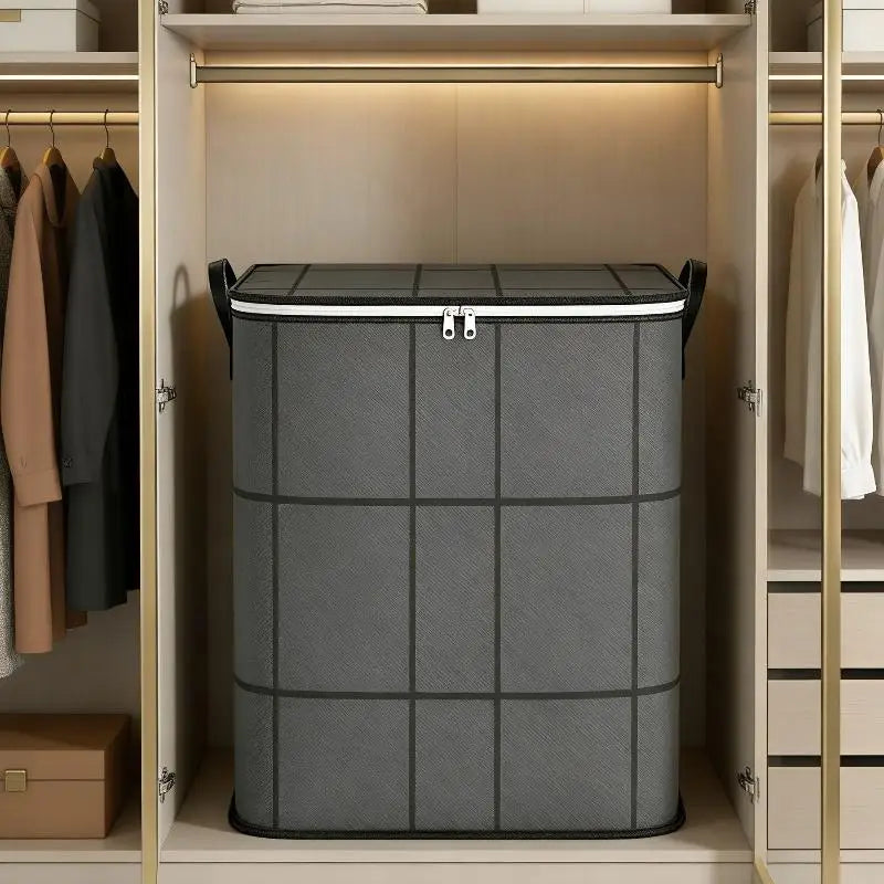 A gray foldable storage bag for clothes and bedding is displayed on a shelf inside a wooden cabinet.