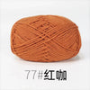 A ball of orange-brown knitting yarn used for crafts.