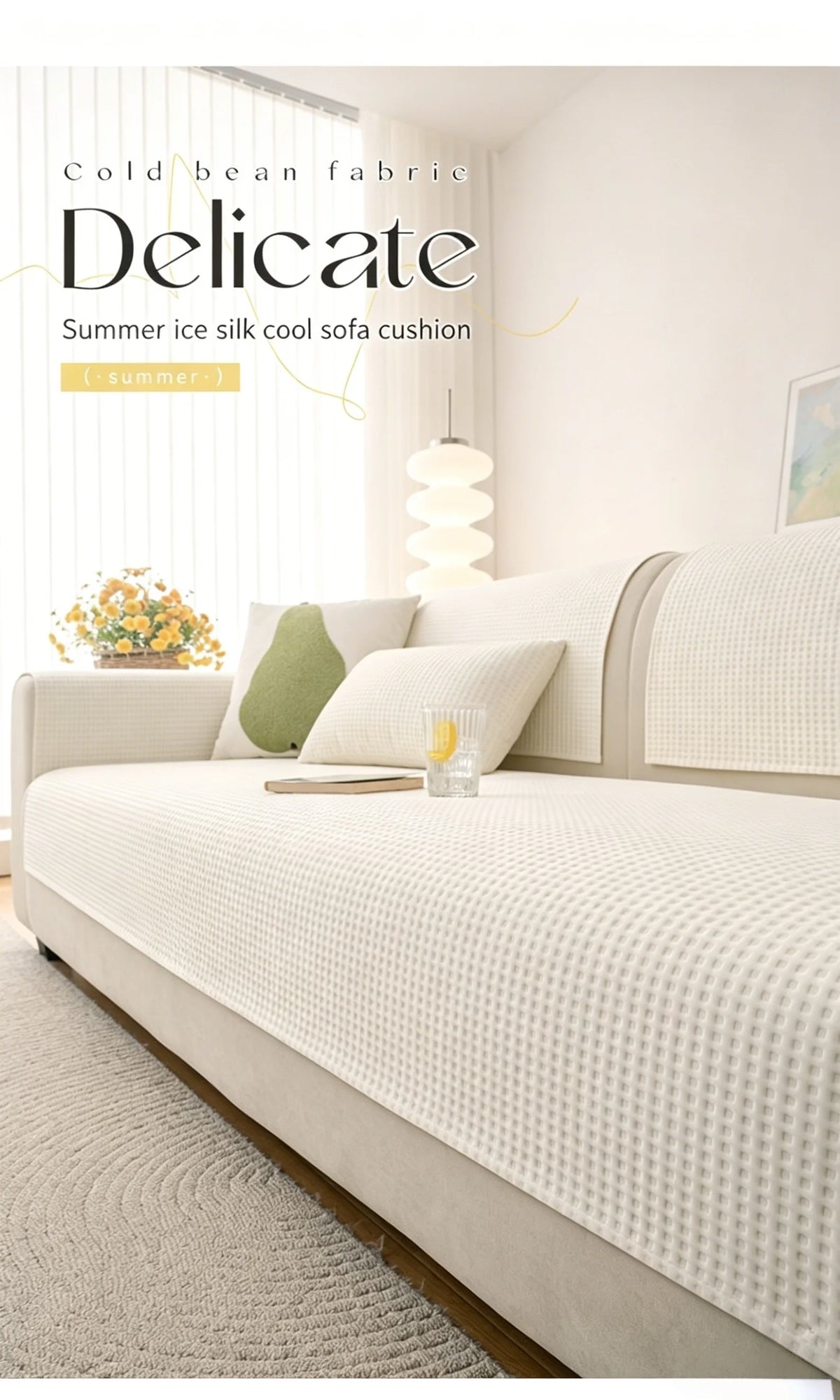 A cream colored sofa cushion with a textured fabric is displayed on a light-colored sofa.