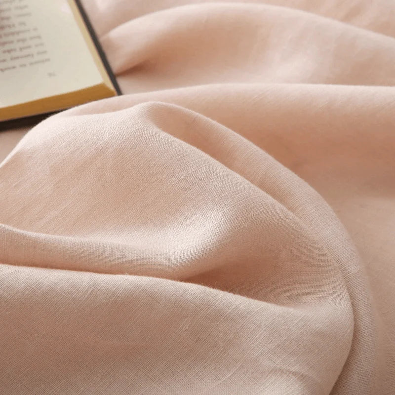 Soft blush pink pure linen flat sheet draped elegantly