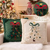 A set of embroidered Christmas tree velvet and jacquard pillow covers with festive red and green designs.