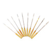 A set of precision sewing needles with gold-colored ferrules arranged diagonally.