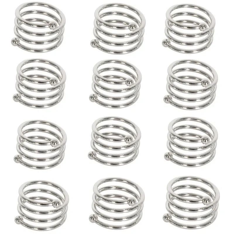 A set of elegant silver metal napkin rings for table decoration.