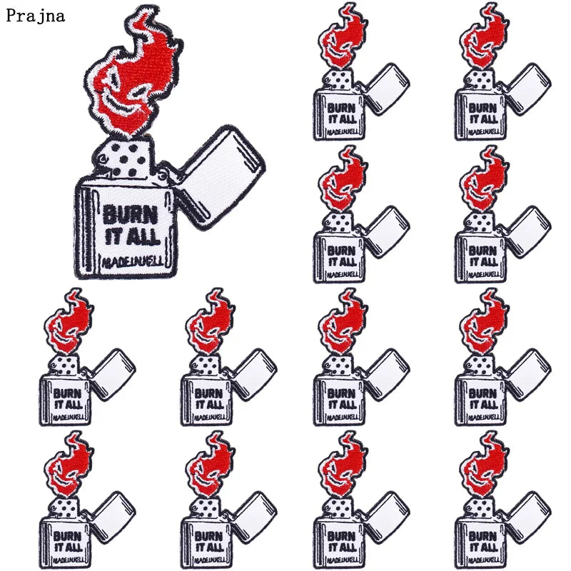 A set of DIY punk embroidery patches featuring a stylized flame design on white fabric.