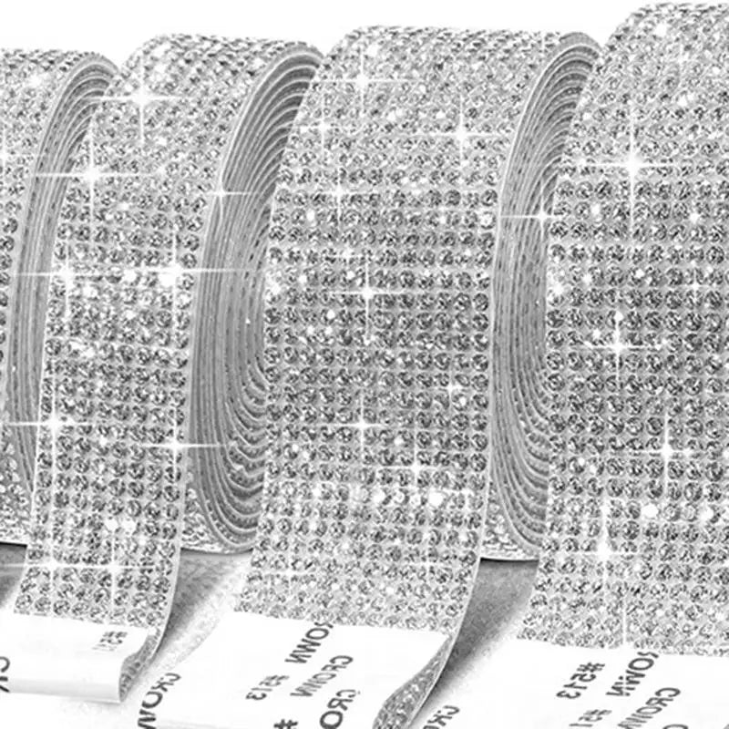 A close-up view of crystal rhinestone sticker ribbon with diamond trim for crafts and decor.