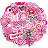 A collection of pink embroidered applique patches featuring various floral, skull, and decorative elements for DIY projects.