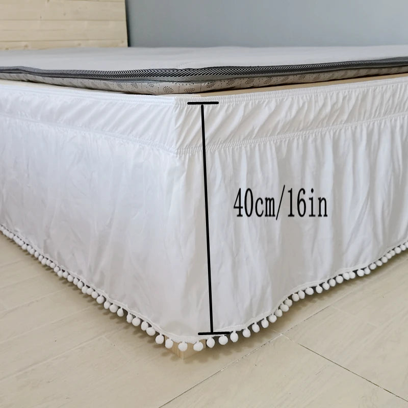 White elastic bed skirt with a measurement line indicating 40cm or 16 inches.
