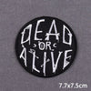 Black embroidered patch with white text reading DEAD OR LIVE