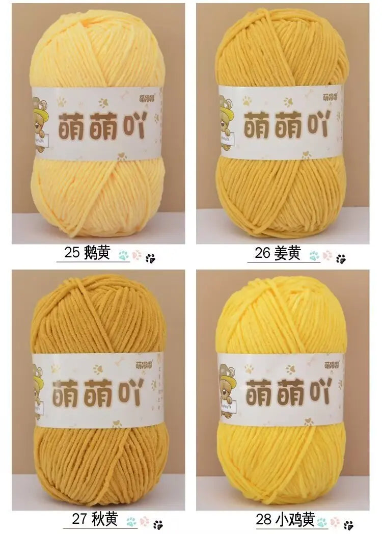 A set of yellow chenille yarn skeins labeled with Chinese characters for crochet and knitting projects.