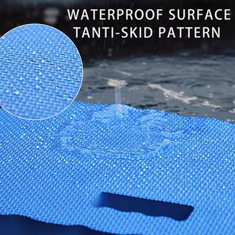 Close-up of a blue waterproof anti-skid mat with a textured pattern placed on a hard floor.