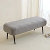 A gray elastic jacquard bench cover used as protection for a piano, dining, or entryway seat.