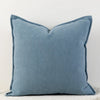 A solid blue-gray chenille throw pillow with a subtle vertical stripe texture.