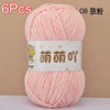A ball of pink soft bulky chenille yarn labeled as 6 pieces for crochet and knitting.