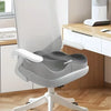 A gray ergonomic memory foam seat cushion mounted on a white office chair with wheels.